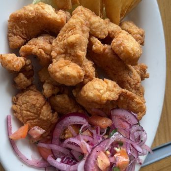 Asumare - Fried Fish! So Crispy Paired With This Onion Is Chefs Kiss - Peruvian Near Me - San Fernando, California Asumare - Fried Fish! So Crispy Paired With This Onion Is Chefs Kiss - Peruvian Near Me - San Fernando, California