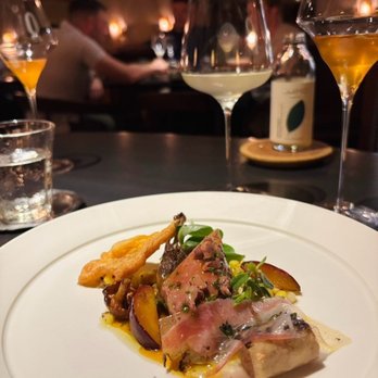 Lielle - California Squab 'Rôtí' -- tender, earthy, and layered with grilled corn and girolles. A dish that defines Lielle's quiet precision. - American Near Me - Los Angeles, California