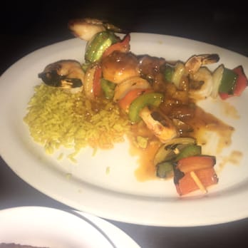 Havana Grill - These are the Alambres...two grilled shrimp skewers with onions green and red peppers served over pineapple rice and a coconut glaze - Cuban Near Me - Chicago, Illinois Havana Grill - These are the Alambres...two grilled shrimp skewers with onions green and red peppers served over pineapple rice and a coconut glaze - Cuban Near Me - Chicago, Illinois