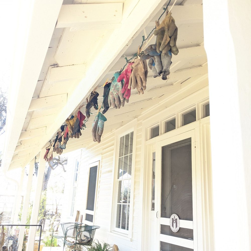 Boggy Creek Farm - Drying gloves on the back porch of main house - Farmers Market Near Me - Austin, Texas Boggy Creek Farm - Drying gloves on the back porch of main house - Farmers Market Near Me - Austin, Texas