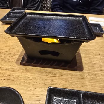 Ten no Meshi - The bbq table. That fire will go out so don't take too long to eat! - Japanese Near Me - Los Angeles, California Ten no Meshi - The bbq table. That fire will go out so don't take too long to eat! - Japanese Near Me - Los Angeles, California