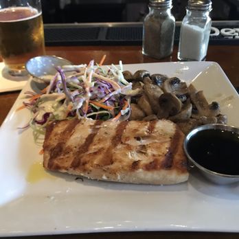 Sand Bar + Kitchen - Grilled mahi with salad & mushrooms - Sports Bars Near Me - Miami Beach, Florida Sand Bar + Kitchen - Grilled mahi with salad & mushrooms - Sports Bars Near Me - Miami Beach, Florida