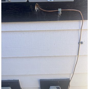 SolarTech - Ugly copper wire and unsealed hole on siding - Solar Installation Near Me - El Cajon, California SolarTech - Ugly copper wire and unsealed hole on siding - Solar Installation Near Me - El Cajon, California
