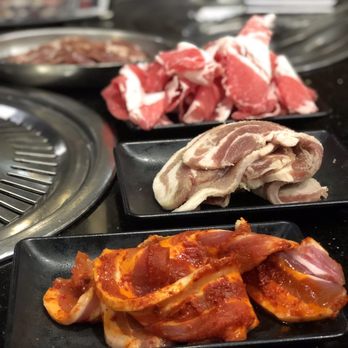 Jong Ga House - In order from front to back: spicy pork belly, garlic pork belly, beef brisket, boneless short ribs - Korean Near Me - Oakland, California Jong Ga House - In order from front to back: spicy pork belly, garlic pork belly, beef brisket, boneless short ribs - Korean Near Me - Oakland, California