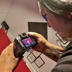 Lost Oasis Records - Behind the scenes over the shoulder shot of our in house photographer capturing headshot photos
