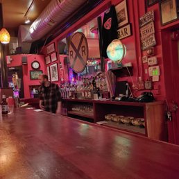 a man sitting at the bar a man sitting at the bar