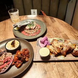 Osito's Tap - Duck Tacos, Wings, and Chicken Thigh