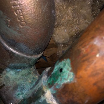 Brouwer Brothers Steamatic - Perfect circle hole in pipe from a drill. I don't understand why they didn't fix this or installed it. - Carpet Cleaning Near Me - Chicago, Illinois