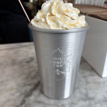 Balzac's Coffee Roasters - Iced Canadian Maple Latte - and in a souvenir cup, of course... - Coffee & Tea Near Me - Stratford, Ontario