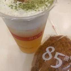 85°C Bakery Cafe-Balboa Mesa - Large Iced Sea Salt Jasmine Green Tea and Pork Sung Bun. 2 beautifully tasteful items as a succulent snack