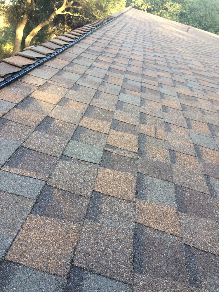 Slide of Kelly Roofing