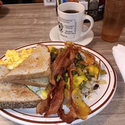 This is their... #1: Two Eggs; Bacon; Rye Toast; and American Home Fries with added Grilled Peppers & American Cheese!!!! This is their... #1: Two Eggs; Bacon; Rye Toast; and American Home Fries with added Grilled Peppers & American Cheese!!!!