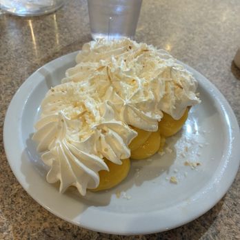 Thunderbird Restaurant - The coconut cream pie. It's a HUGE slice, I ate half at lunch and the other half at dinner later. Very interesting and delicious! - American Near Me - Mt. Carmel Junction, Utah Thunderbird Restaurant - The coconut cream pie. It's a HUGE slice, I ate half at lunch and the other half at dinner later. Very interesting and delicious! - American Near Me - Mt. Carmel Junction, Utah