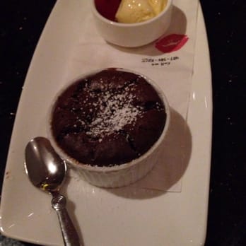 The Kitchen - Fresh hot chocolate soufflés with vanilla bean ice cream - New American Near Me - Orlando, Florida The Kitchen - Fresh hot chocolate soufflés with vanilla bean ice cream - New American Near Me - Orlando, Florida