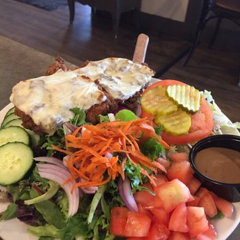 Brass Monkey - Crispy chicken sandwich with side salad - Bars Near Me - Providence, Rhode Island