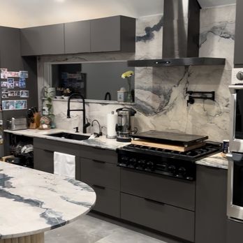 In Motion Handyman Service - Modern kitchen remodel with custom cabinets and marble countertops. - Handyman Near Me - Oklahoma City, Oklahoma In Motion Handyman Service - Modern kitchen remodel with custom cabinets and marble countertops. - Handyman Near Me - Oklahoma City, Oklahoma