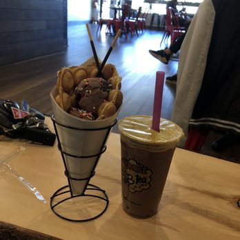 Bumble Tea - Supreme Chocolate with boba and Bumble Waffle with chocolate ice cream, rainbow sprinkles, and chocolate pocky sticks - Coffee & Tea Near Me - Raleigh, North Carolina Bumble Tea - Supreme Chocolate with boba and Bumble Waffle with chocolate ice cream, rainbow sprinkles, and chocolate pocky sticks - Coffee & Tea Near Me - Raleigh, North Carolina