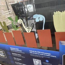 Sherwin-Williams Paint Store - Some paint chip art on the cashier glass