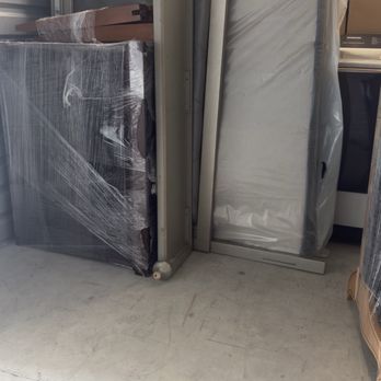 Bellinger's Moving Services - Unwrapped head and base boards. Wrapped bookshelves with items still on them. - Movers Near Me Bellinger's Moving Services - Unwrapped head and base boards. Wrapped bookshelves with items still on them. - Movers Near Me