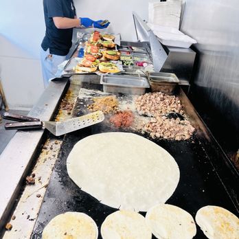 Tacos Chihuas - a woman making tortillas - Food Trucks Near Me - Denver, Colorado Tacos Chihuas - a woman making tortillas - Food Trucks Near Me - Denver, Colorado