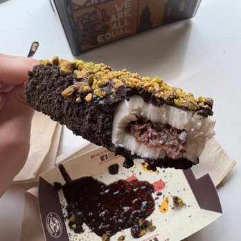 Morelia Gourmet Paletas - Banana filled with nutella + dipped in dark chocolate + Oreo and pistachio toppings - Desserts Near Me - Hoboken, New Jersey