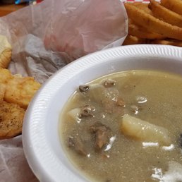 a bowl of soup and a sandwich