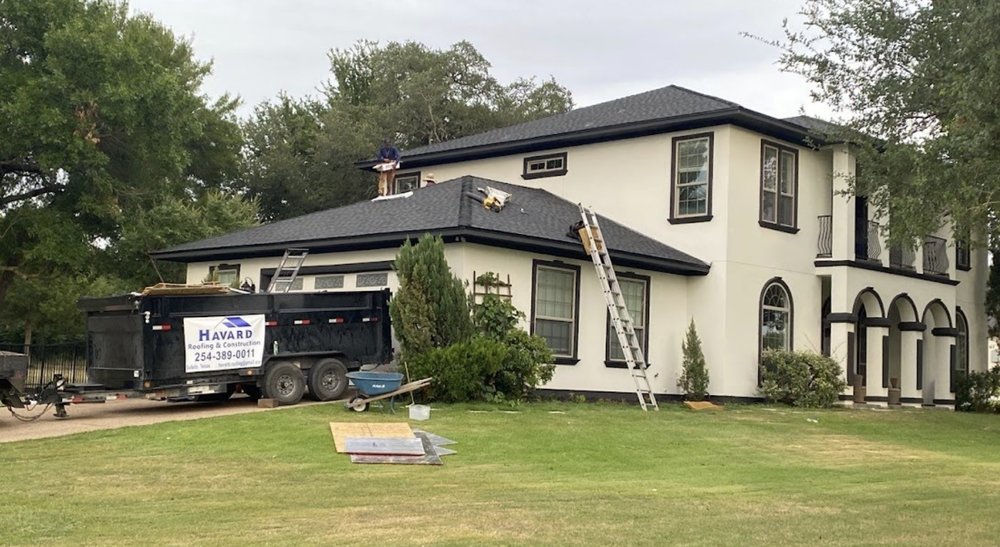 Slide of Havard Roofing