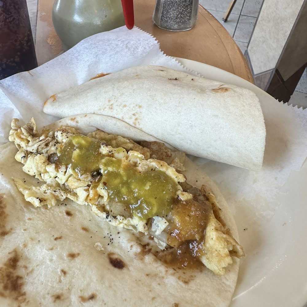Potato and egg visible and carne guisada not opened yet and very good.