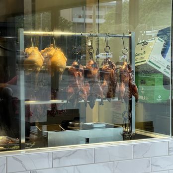 Sandy's Cafe - Hanging window - Cantonese Near Me - Honolulu, Hawaii