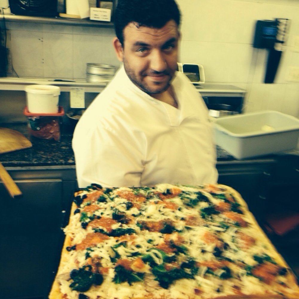 Gigis Pizza - My deluxe pizza creation before going into the oven - Pizza Near Me - New Hyde Park, New York Gigis Pizza - My deluxe pizza creation before going into the oven - Pizza Near Me - New Hyde Park, New York