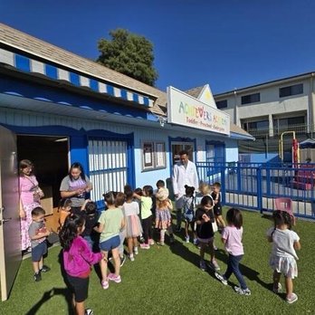 Achievers Academy Preschool - Our eldest kid's class in the front yard. The blue and white awning can extend for extra shade on hot days. - Preschools Near Me - Los Angeles, California Achievers Academy Preschool - Our eldest kid's class in the front yard. The blue and white awning can extend for extra shade on hot days. - Preschools Near Me - Los Angeles, California