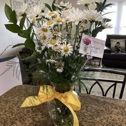 Church Hill Florist & Gifts - This is their dancing daisies Not Dancing, and not Gerber. The vase costed more than the flowers.