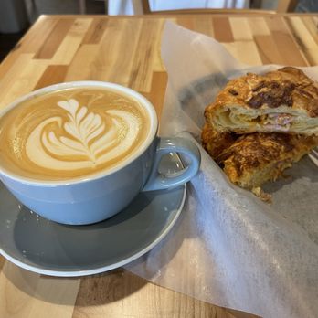 Artisan Bakery Cafe - Latte with Ham & Cheese Breakfast Croissant @ Artisan Bakery Cafe. - Coffee & Tea Near Me - Medford, Oregon