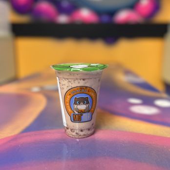 Mo'Tea & Banh Mi - a cup of coffee on a table - Sandwiches Near Me - Naperville, Illinois