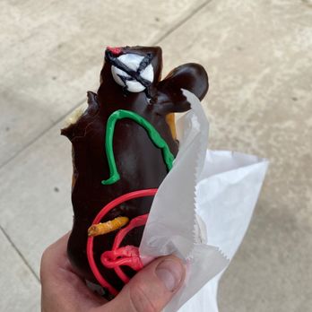 Voodoo Doughnut - Voodoo doll missing an arm, ate it before taking the photo - Donuts Near Me - Houston, Texas Voodoo Doughnut - Voodoo doll missing an arm, ate it before taking the photo - Donuts Near Me - Houston, Texas