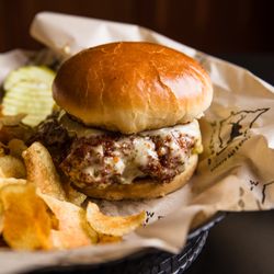 Wildwood Sports Bar & Grill - Get your Chicken Sandwich with grilled chicken tossed in any of our wing sauces, melted pepper-jack cheese on a toasted egg bun.