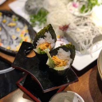 Bada Story - a plate of sushi and a bowl of sauce - Korean Near Me - Fort Lee, New Jersey