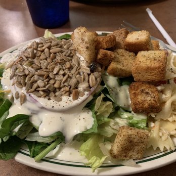 Jimmy O's Pizzeria - a salad with sunflower seeds and croutons - Pizza Near Me - Oregon City, Oregon