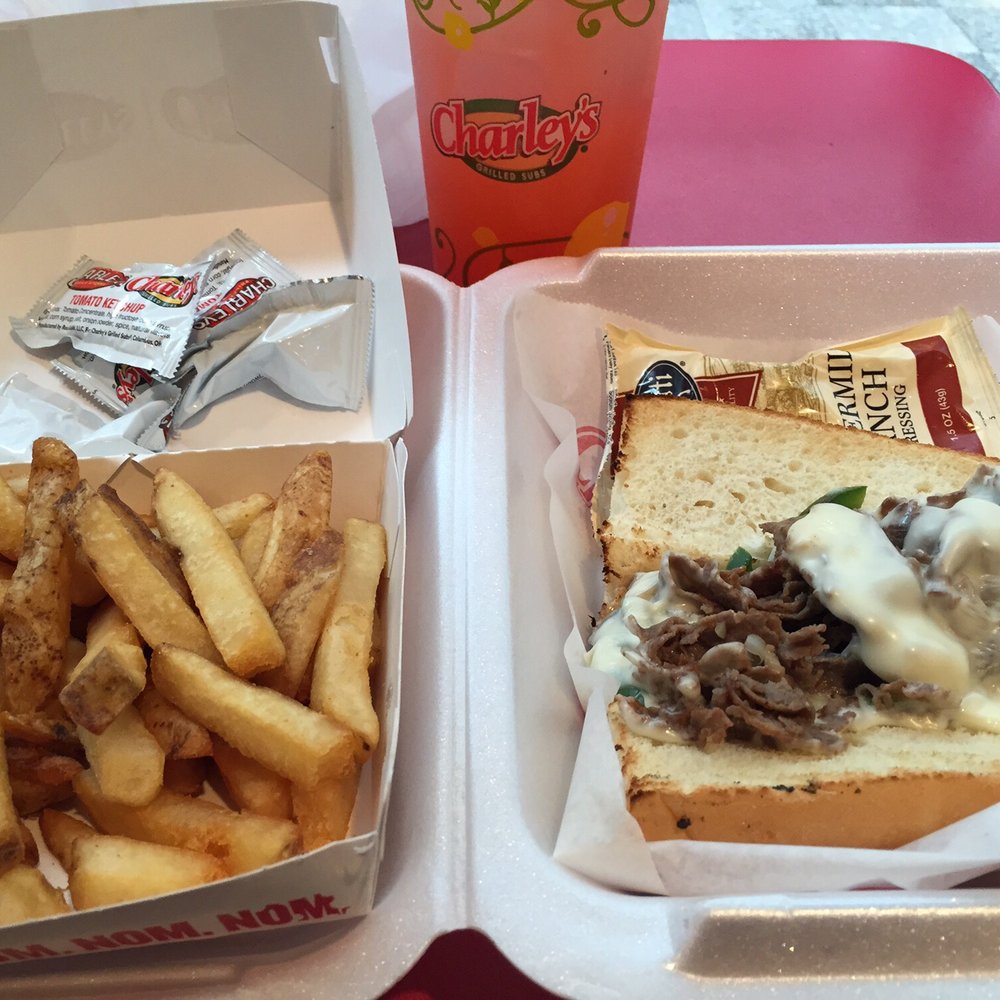 Small philly cheesesteak, fries, and strawberry lenonade. Small philly cheesesteak, fries, and strawberry lenonade.