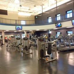 Connie Wold Wellness Center - Two-story gym with weights and cardio on the lower level.