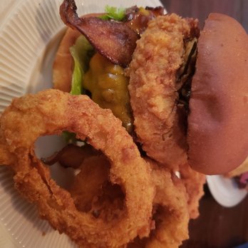 Wharf Hill Brewing - The cowboy burger with onion rings - Bars Near Me - Smithfield, Virginia Wharf Hill Brewing - The cowboy burger with onion rings - Bars Near Me - Smithfield, Virginia