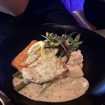 Wild Rose Eatery and Bar - Pan Seared Salmon served over mashed potatoes and asparagus. - Cocktail Bars Near Me - Campbell, California Wild Rose Eatery and Bar - Pan Seared Salmon served over mashed potatoes and asparagus. - Cocktail Bars Near Me - Campbell, California