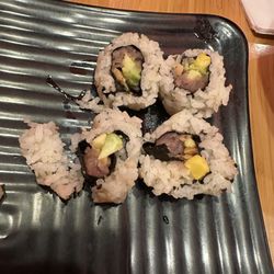 Tokyo Joe's - This is what you get when you order a 4-piece sushi. Yes, it was served to me like this!