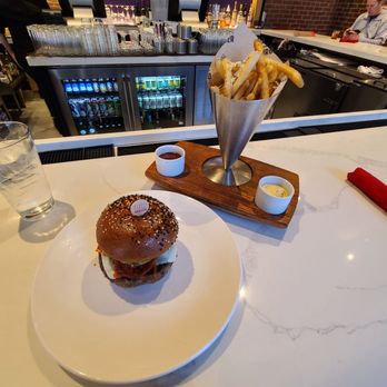 Gordon Ramsay Burger - Hell's kitchen burger and truffle fries.  Presentation was much better than the food quality.  Very disappointing. - Salad Near Me - Chicago, Illinois