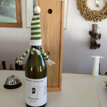 Raftshol Vineyards - a bottle of wine on a table - Wineries Near Me - Suttons Bay, Michigan Raftshol Vineyards - a bottle of wine on a table - Wineries Near Me - Suttons Bay, Michigan