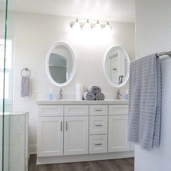 Massiv Construction - a bathroom with two sinks and a shower - General Contractors Near Me - Vista, California Massiv Construction - a bathroom with two sinks and a shower - General Contractors Near Me - Vista, California