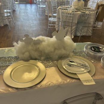 Encanto Gardens - The Husband and Wife who were have the Baby Table  Why are they looking at white cardboard cut out - Venues & Event Spaces Near Me - Augusta, Georgia