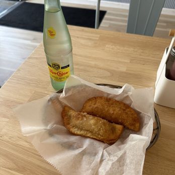Tico’s Cuban-American Cafetería - Topo Chico & 2 breakfast empanadas (potato, egg and cheese) - Cuban Near Me - Brooklyn, New York Tico’s Cuban-American Cafetería - Topo Chico & 2 breakfast empanadas (potato, egg and cheese) - Cuban Near Me - Brooklyn, New York