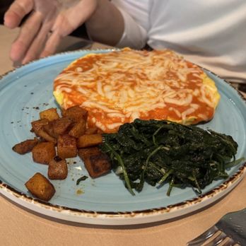 Ca Del Sole - Omelette Alla Parmigiana - three organic eggs, spinach, onions, marinara sauce, mozzarella, parmesan - Italian Near Me - Toluca Lake, California Ca Del Sole - Omelette Alla Parmigiana - three organic eggs, spinach, onions, marinara sauce, mozzarella, parmesan - Italian Near Me - Toluca Lake, California