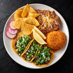 Fuego Cravings - Three street tacos with your choice of meat, served with fluffy rice, hearty beans, a medium drink, and a side of small chips.